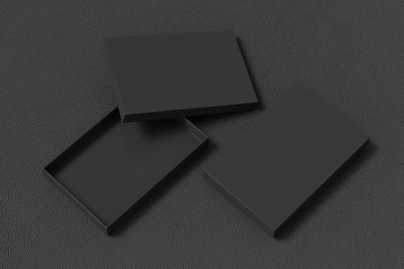 Blank open and closed black flat gift box mock up on black background.の写真素材