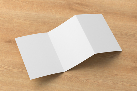 Blank unfolded trifold of three of A5/A4 pages brochure booklet on wooden background. 3D illustrationの写真素材