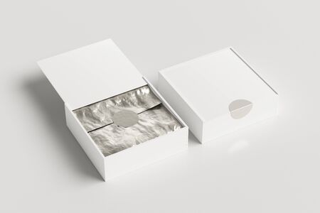 Two white square boxes with sliding lid on white background. Opened with wrapping paper and closed...