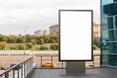 Blank street billboard poster stand mock up in downtown with city background. 3d illustration.の写真素材