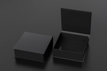 Blank black flat square gift box with open and closed hinged flap lid on black background.の写真素材