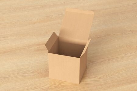 Blank cardboard cube gift box with opened hinged flap lid on wooden background.