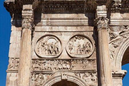 Bas-reliefs on the Arch of Constantine (Arco di Costantino) triumphal arch. Rome, Italyの写真素材