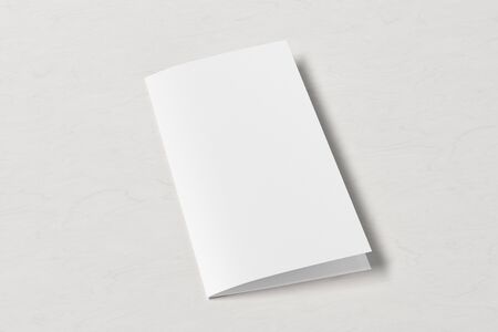 Blank square leaflet on white wooden background. Bi-fold or half-fold closed brochure isolated. Side...