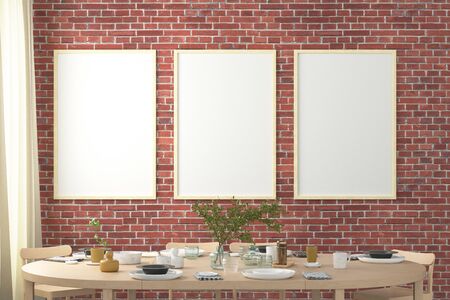 Three vertical blank posters on red brick wall in interior of modern dining room. Clipping path...
