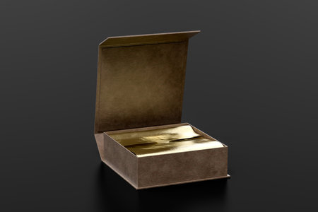 Leather opened square folding gift box mock up with gold wrapping paper on black background. Side view. 3d illustration.の写真素材