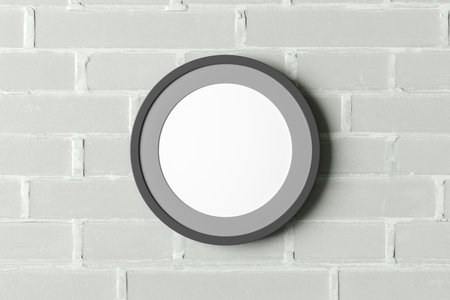 Dark wooden round frame poster mock up on the  white brick wall. Front view. 3d illustrationの写真素材