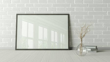 Horizontal poster frame mock up on the floor in living room with white floor and white brick wall. 3d illustrationの写真素材