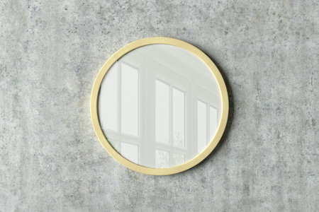 Wooden round frame poster mock up on the concrete wall. Front view. 3d illustrationの写真素材