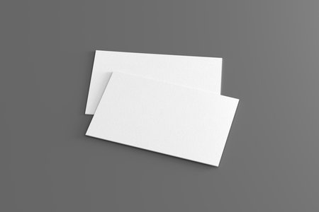 Business card mockup. Pair of business card on gray background. Side view. 3d illustrationの写真素材