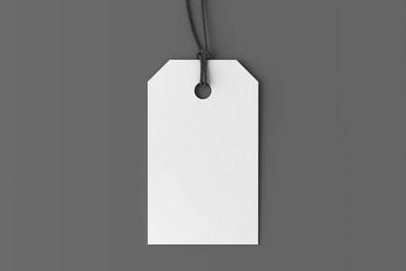 White tag mockup on gray background. View directly above. 3d illustrationの写真素材