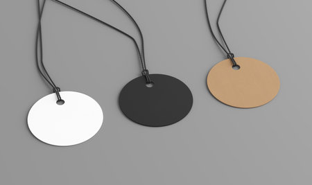 White, cardboard, black round tags mockup on gray background. Side view. 3d illustrationの写真素材