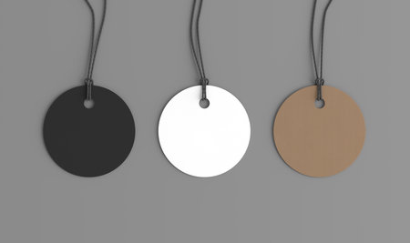 White, cardboard, black round tags mockup on gray background. View directly above. 3d illustrationの写真素材