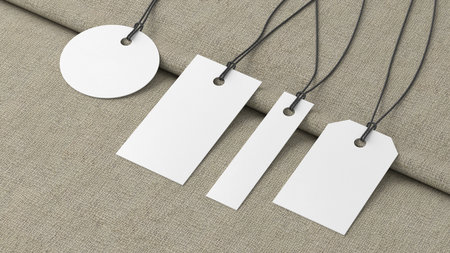 White tags of various shapes mockup on fabric background. Side view. 3d illustrationの写真素材