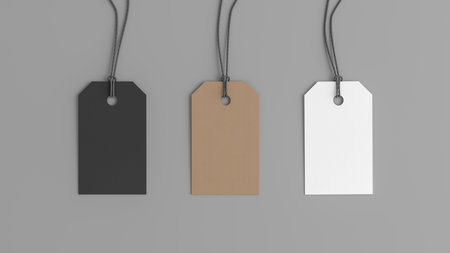 White, cardboard, black tags mockup on gray background. View directly above. 3d illustrationの写真素材