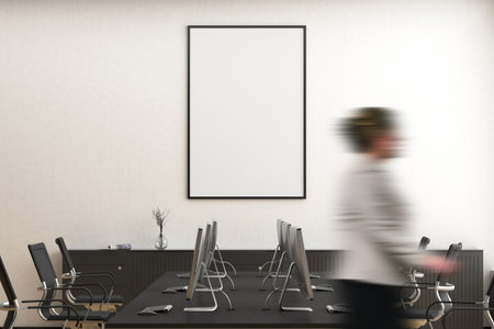 Blank vertical poster mock up on the white wall in office interior. 3d render.の写真素材