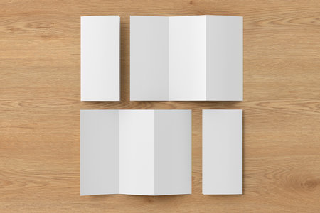 Vertical pages accordion or zigzag trifold brochure mockup on wooden background. Three panels, six pages leaflet. 3d illustrationの写真素材