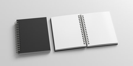 Notebook mockup. Closed and open blank notebook with black cover. Spiral notepad on white background. 3d illustrationの写真素材