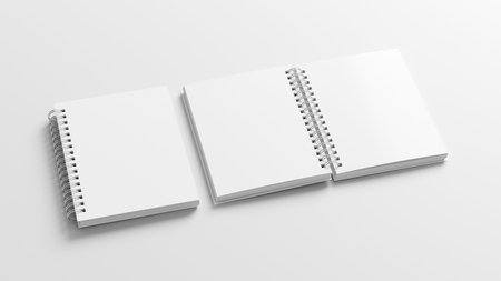 Notebook mockup. Closed and open blank notebook with white cover. Spiral notepad on white background. 3d illustrationの写真素材