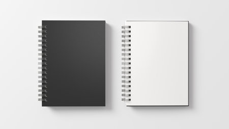 Notebook mockup. Closed and open blank notebook with black cover. Spiral notepad on white background. 3d illustrationの写真素材