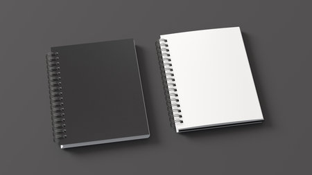 Notebook mockup. Closed and open blank notebook with black cover. Spiral notepad on gray background. 3d illustrationの写真素材