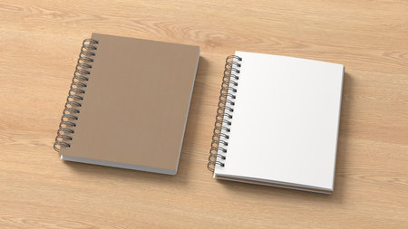 Notebook mockup. Closed and open blank notebook with craft paper cover. Spiral notepad on wooden background. 3d illustrationの写真素材