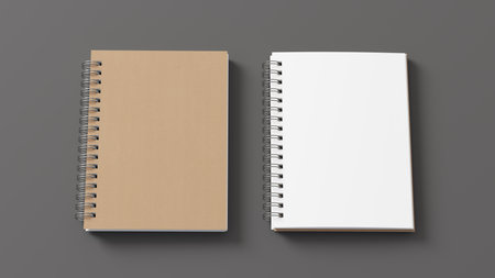Notebook mockup. Closed and open blank notebook with craft paper cover. Spiral notepad on gray background. 3d illustrationの写真素材