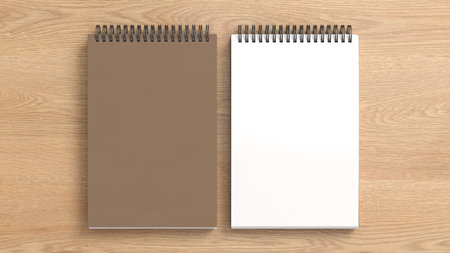 Notebook mockup. Closed and open blank notebook brown paper cover. Spiral notepad on wooden background. 3d illustrationの写真素材