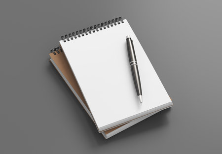Notebook mockup. Two notebooks in a stack and pen. Spiral notepad on gray background. 3d illustrationの写真素材