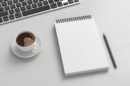 Notebook mockup. Blank workplace notebook. Spiral notepad on white wooden desk. 3d illustrationの写真素材