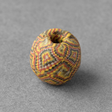 Ancient roman glass mosaic beadの写真素材