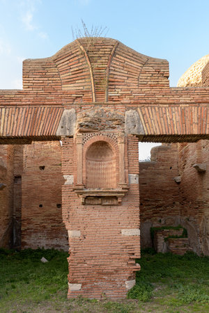Detail of the niche of House of the Lararium in Ostia Antica. Ruins of ancient roman city and port. Rome, Latium, Italyのeditorial素材