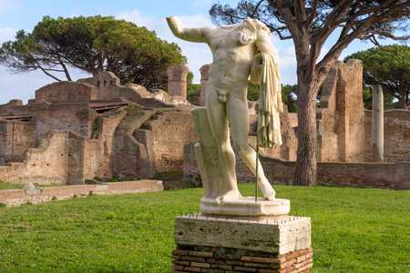 Ostia Antica. The "heroic" statue. Ruins of ancient roman city and port. Rome, Latium, Italyのeditorial素材