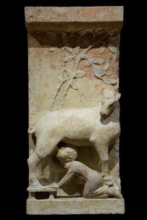 Goat nursing a baby boy, Capricorn - sculpture from Ferrara cathedral by Maestro dei Mesi. Italyのeditorial素材