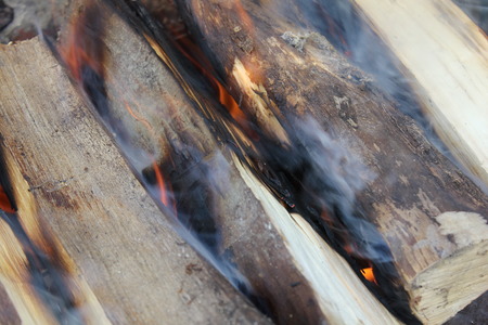 Smoked wood burning in a barbecue 20233の写真素材