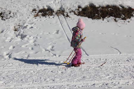 Young girl skiing on ski trackの写真素材