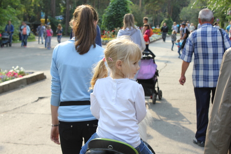 NOVOSIBIRSK, RUSSIA - APR 16: Girl riding a pony in Zoo on Apr 16, 2016 in Novosibirskのeditorial素材