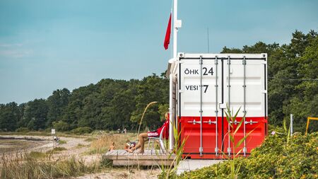 TALLINN, ESTONIA- JULY 29, 2018: G4S Beach guard works at Kakumae Beach daily in summer time.  AS G4S Eesti is owned by G4S, an international group specialising in providing security services.のeditorial素材