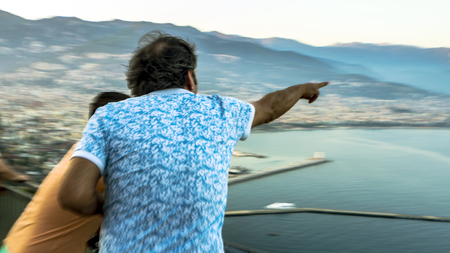 Shocked friends discovered an amazing panorama on holidays. Beautiful view of mountains in Alanya city, Turkey. Travel and tourism conceptの写真素材