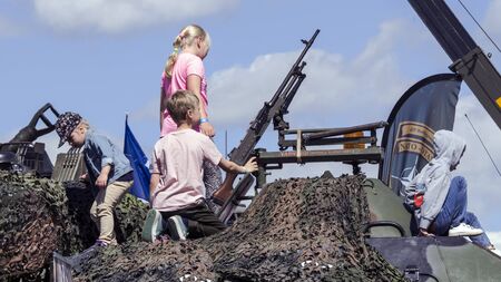 LANGE, KASTRE, TARTUMAA, ESTONIA - JUNE 9, 2018: Estonian Aviation Days on the territory of Museum. People are interested in NATO military equipment. Big Gun Little Kidsのeditorial素材