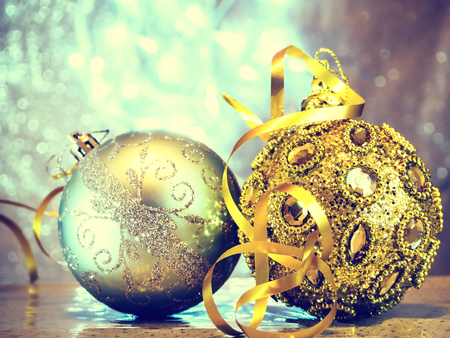 Fir tree decoration. New Year 2019. Light background. New Year mood, Christmas tree toys. Bokeh. festive. Blurred Christmas Lights Background. Copy space. Vintage tone filter effect color style.の写真素材