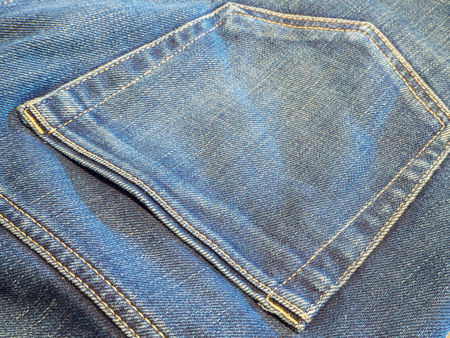 blue Jeans close-up with pocket. Denim texture , Denim background , Denim choppy fashion.