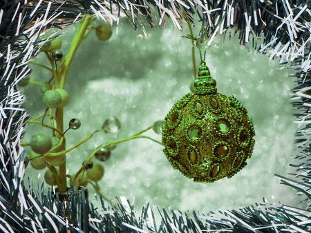 Fir tree decoration. Light background. New Year mood, Christmas tree toys. Lights, bokeh or Abstract Blurred Christmas Lights desktop, postcards, wallpaper. Copy space for design.の写真素材