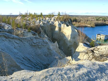 Abandoned Quarry Of Rummu, Estonia. Scenic View Of Land. Mountain of white sand and stones. Panoramic View. The erosion of limestone quarry. Sandy hill. Beautiful Texture of surface. Earth, explore.の写真素材