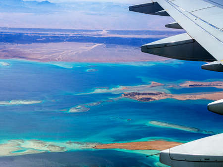Aerial view above the clouds and sky, Inspiration concept. Travel freedom by air. Flight, view from...