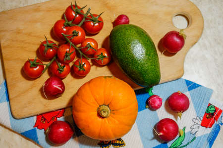 Assortment of fresh vegetables. autumn harvesting vegetables - tomatoes zucchini pumpkin radish....
