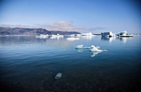 Melting glacier in Iceland. Clear water. The ice on the water