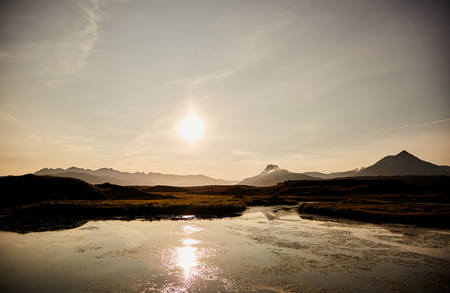 Sunset in Iceland. The silhouettes of the mountainsの写真素材