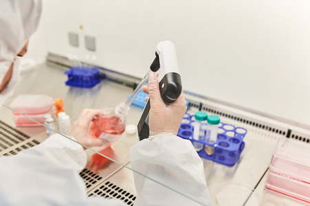 Doctor in the laboratory. The scientist conducts research. Blood test.の写真素材