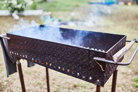 Grill with steaming coals. Chargrill. The barbecue.の写真素材